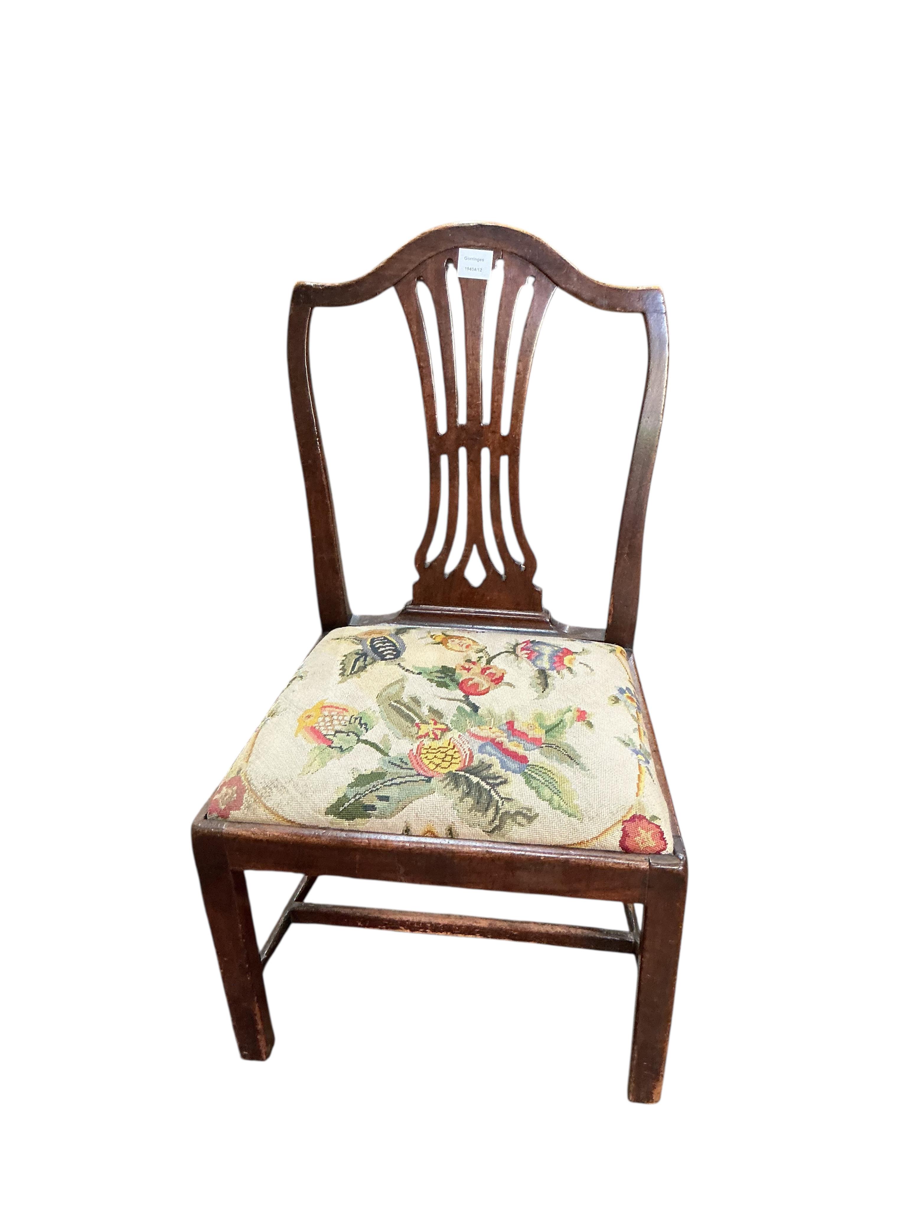A George III mahogany dining chair and a later George III style inlaid mahogany elbow chair